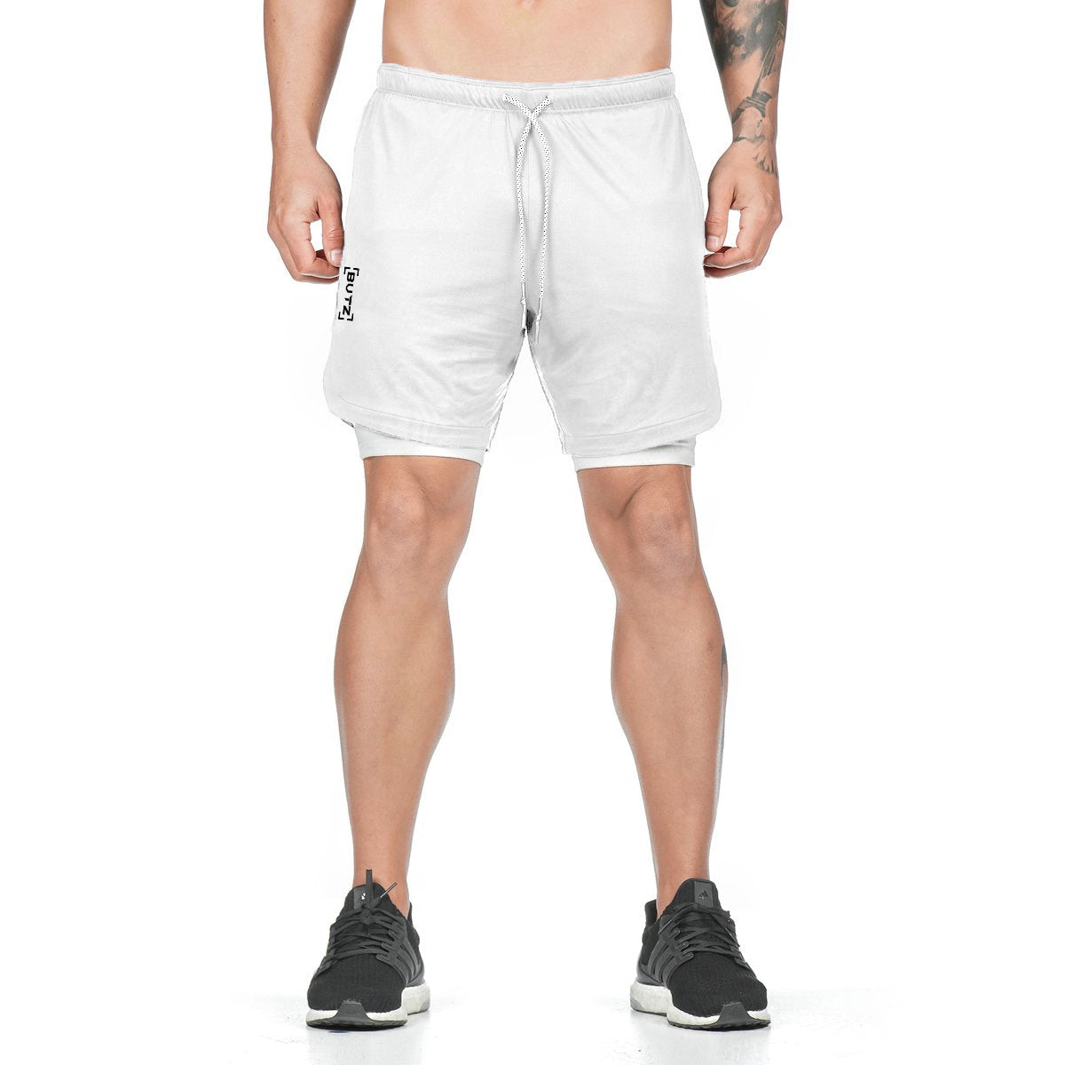 Pantalones cortos de compresión con bolsillo.
