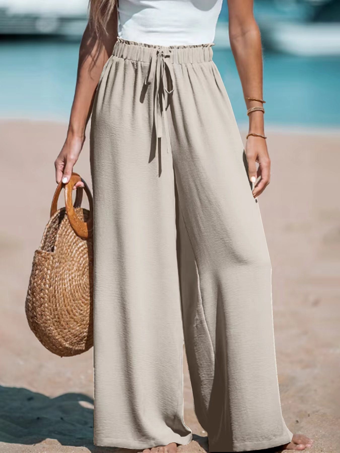 Pantalones anchos casuales sueltos con cordón falso de moda para mujer