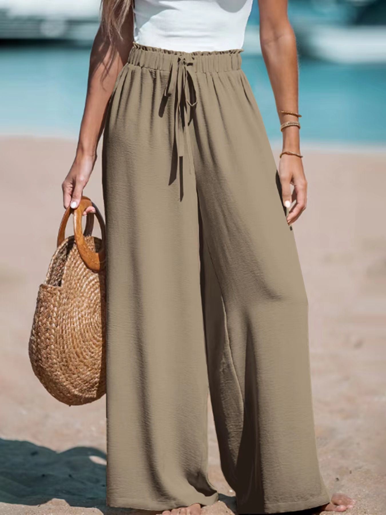 Pantalones anchos casuales sueltos con cordón falso de moda para mujer