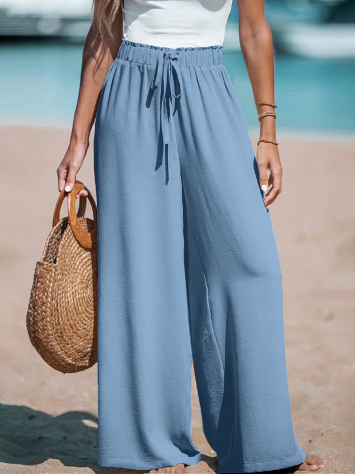 Pantalones anchos casuales sueltos con cordón falso de moda para mujer