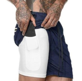 Pantalones cortos de compresión con bolsillo.